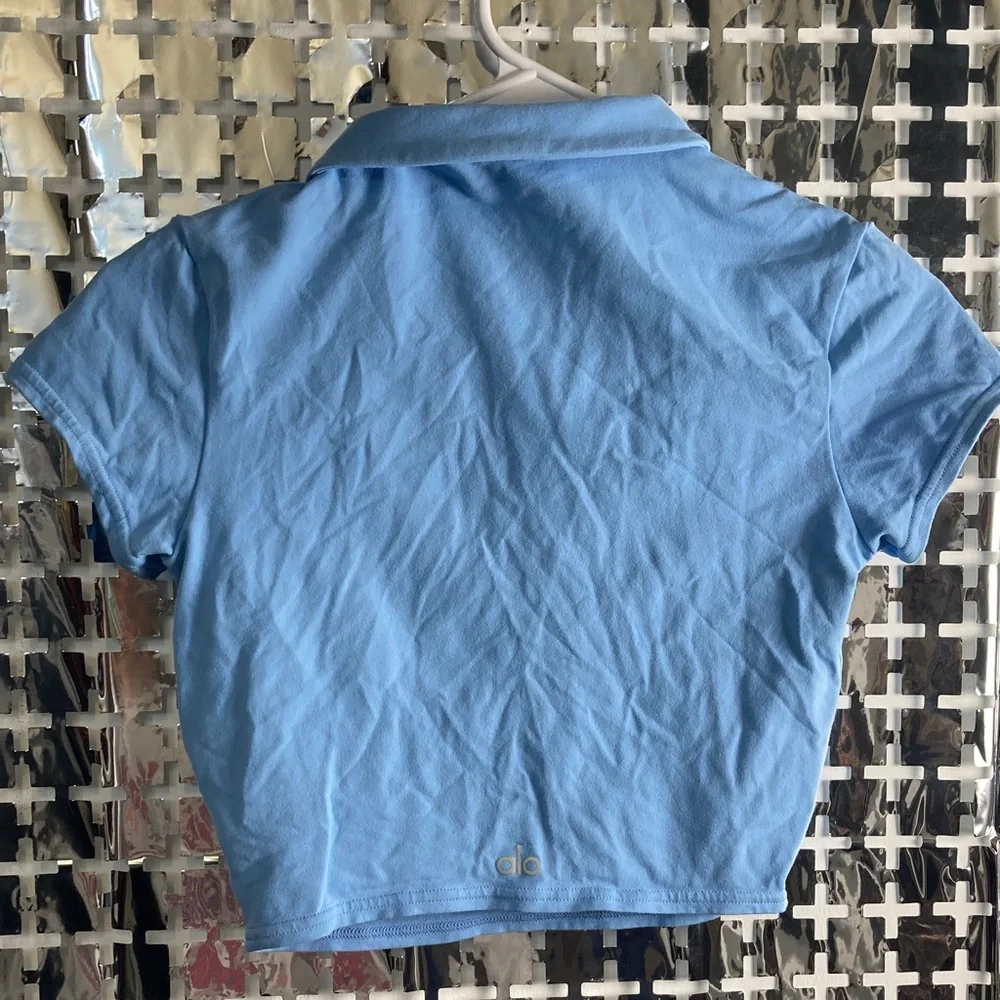 ALO Yoga Light Blue Cropped Polo Top